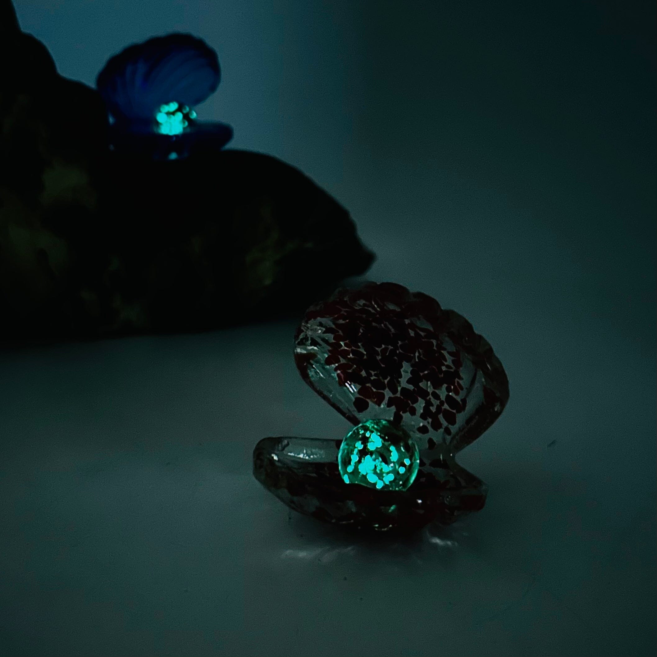 Glow in The Dark Pearl in Shell, Blue - Luke Adams Glass Blowing