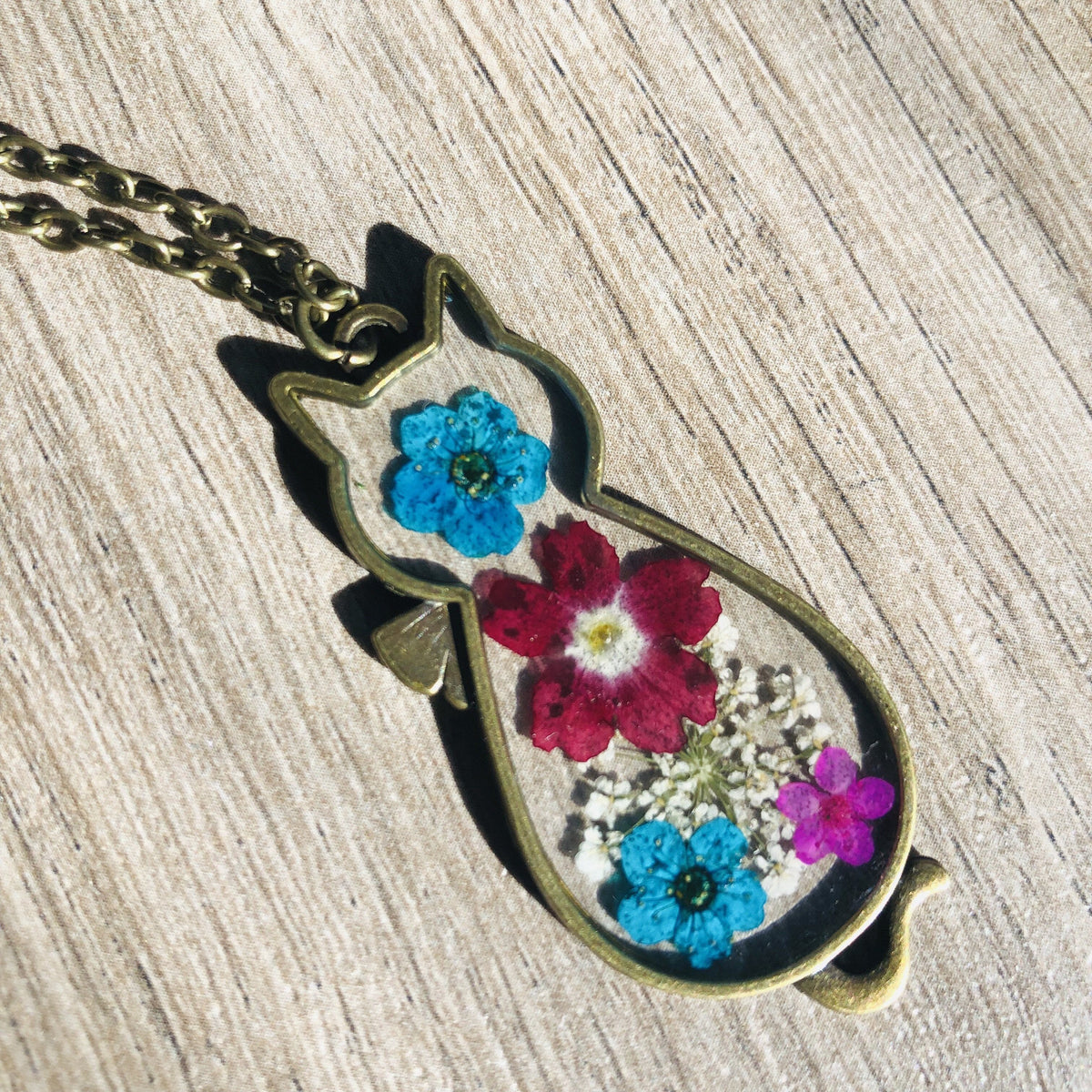 Pressed Flower Cat Shaped Necklace Luke Adams Glass Blowing Studio 